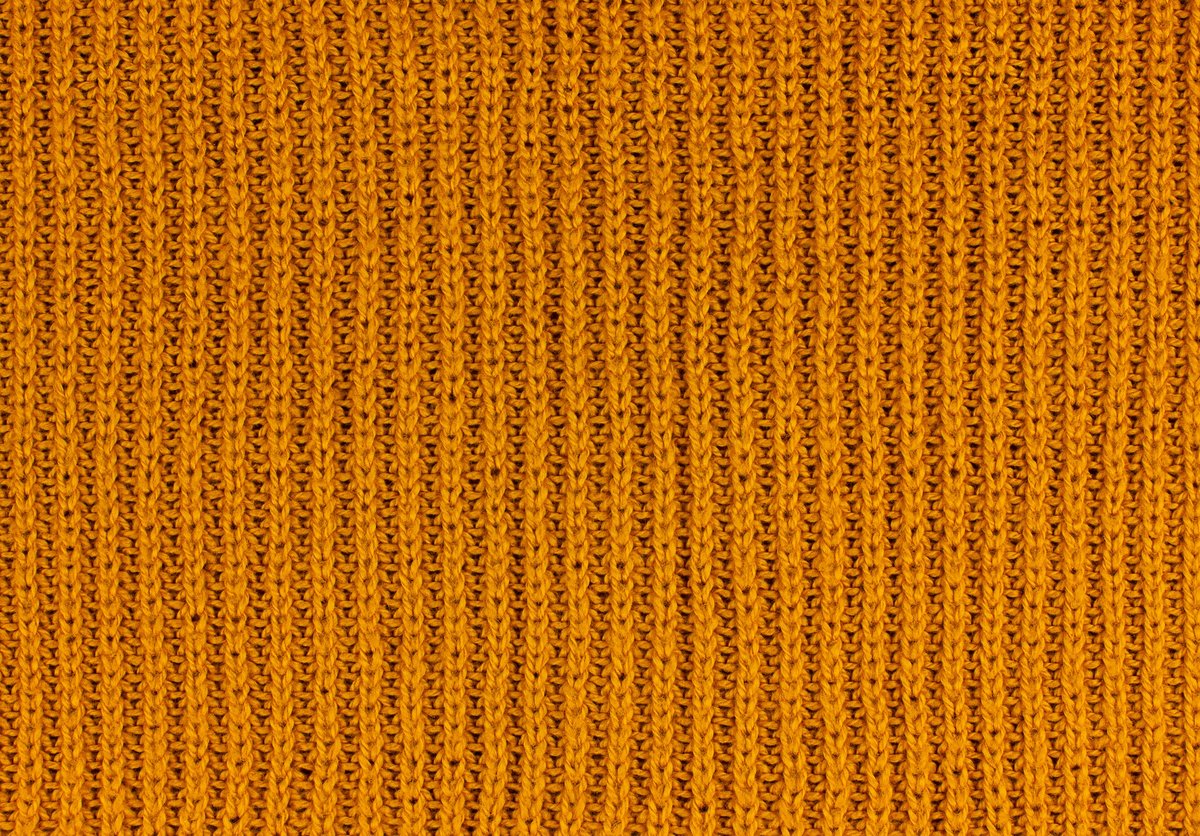 Orange knitted wool texture